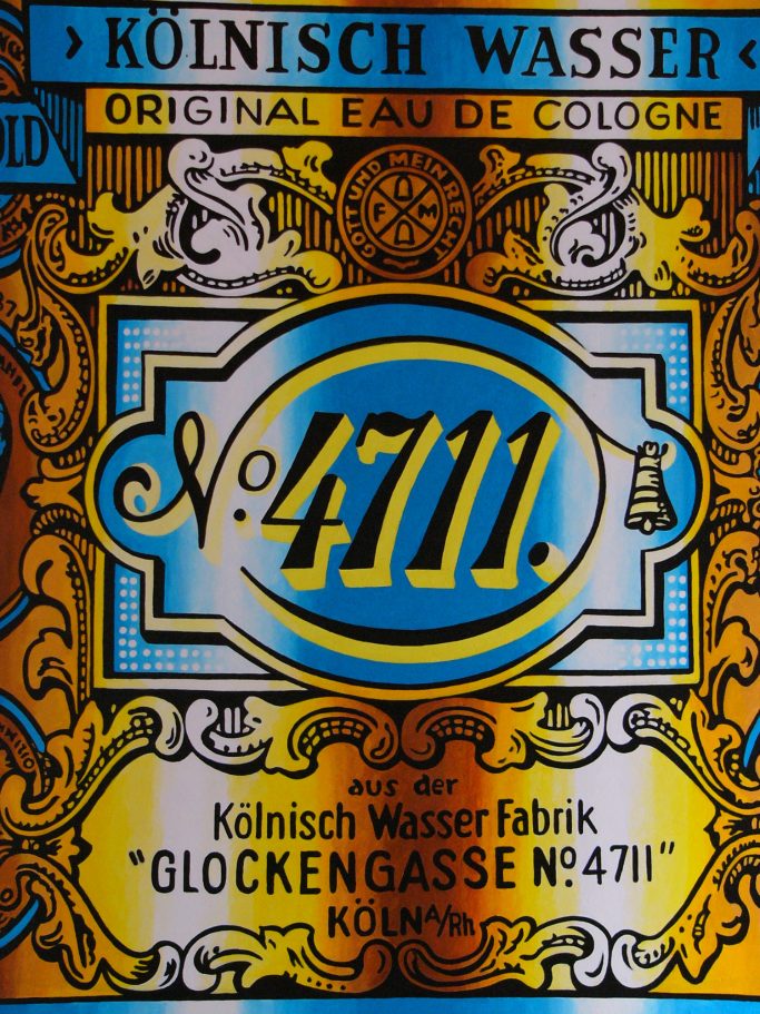 Bunte vintage Verpackung von Kölnisch Wasser, nummeriert 4711, mit stilvollen Verzierungen.